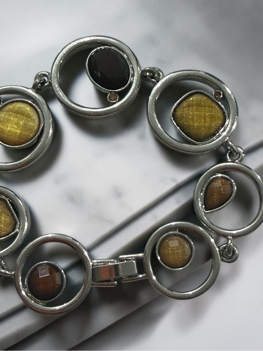 Stylish Silver Tone Bracelet with Golden Brown Accents